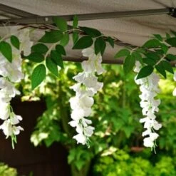 Solar Powered 180cm Artificial Leaf Garland With Wisteria Flowers - Warm White 9 Solar Powered 180cm Artificial Leaf Garland With Wisteria Flowers - Warm White -Outdoor Garden Store 379258 180cm solar powered artificial leaf garland with wisteria flowers 20 warm white micro leds